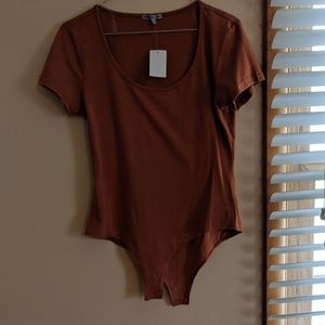 Rust orange body suit